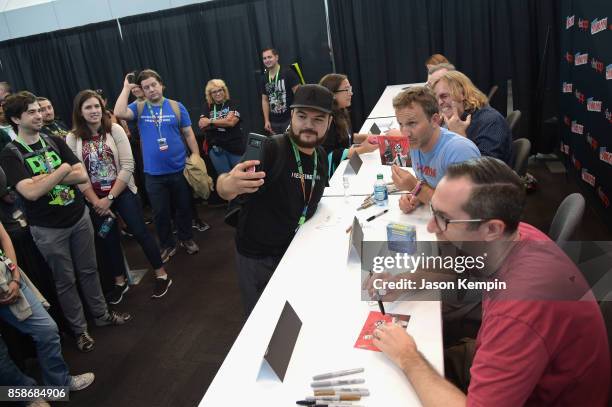 Tom Sheppard, Breckin Meyer, and Matt Senreich attend the Robot Chicken signing during New York Comic Con 2017 - JK at Jacob K. Javits Convention...