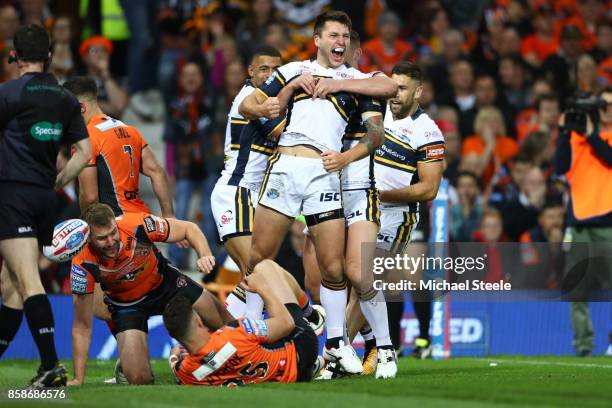 Tom Briscoe of Leeds Rhinos celebrates scoring the first try during the Betfred Super League Grand Final match between Castleford Tigers and Leeds...