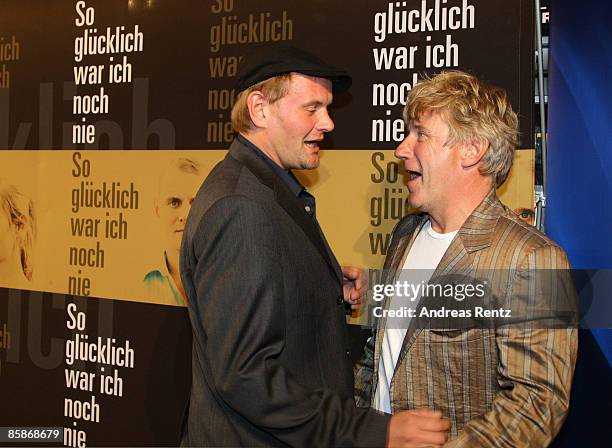 Actors Devid Striesow and Joerg Schuettauf attend the premiere of 'So gluecklich war ich noch nie' at the cinema at the KulturBrauerei on April 8,...