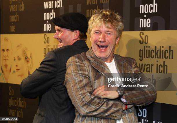 Actors Devid Striesow and Joerg Schuettauf attend the premiere of 'So gluecklich war ich noch nie' at the cinema at the KulturBrauerei on April 8,...