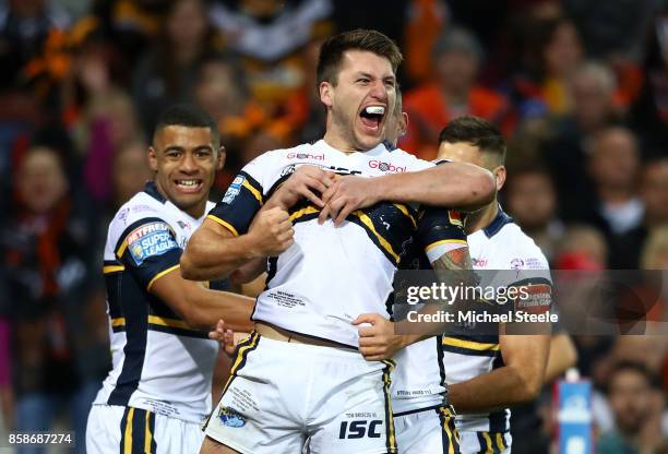 Tom Briscoe of Leeds Rhinos celebrates scoring the first try during the Betfred Super League Grand Final match between Castleford Tigers and Leeds...