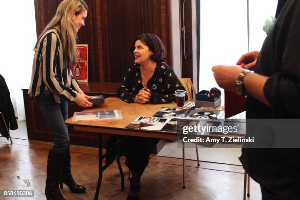 Actress Sherilyn Fenn, who played the character Audrey Horne on the TV show Twin Peaks, talks to fan Catherine Hartle during the Twin Peaks UK...