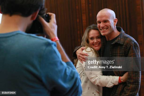 Actor James Marshall, who played the character James Hurley on the TV show Twin Peaks, poses with a fan during the Twin Peaks UK Festival 2017 at...