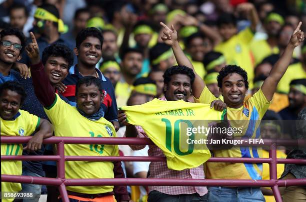 Fans cheer during the FIFA U-17 World Cup India 2017 group D match between Brazil and Spain at Jawaharlal Nehru International Stadium on October 7,...