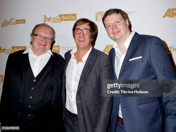 Stefan Arndt, Uwe Schott and Michael Polle attend the oremiere Of Beta Film's 'Babylon Berlin' at The Theatre at Ace Hotel on October 6, 2017 in Los...