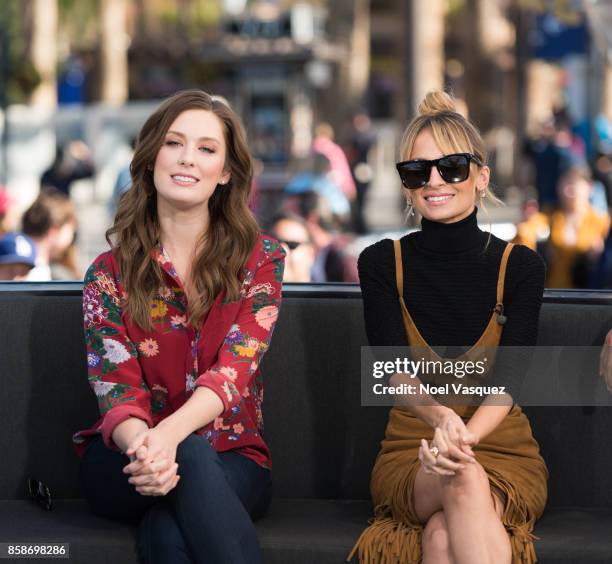 Briga Heelan and Nicole Richie visit 'Extra' at Universal Studios Hollywood on October 5, 2017 in Universal City, California.