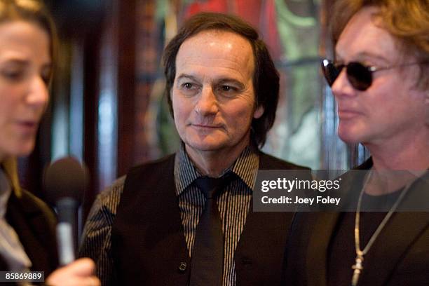 Jim Bonfanti and Eric Carmen of The Raspberries attend a memorabilia donation at the Hard Rock Cafe on April 4, 2009 in Cleveland, Ohio.