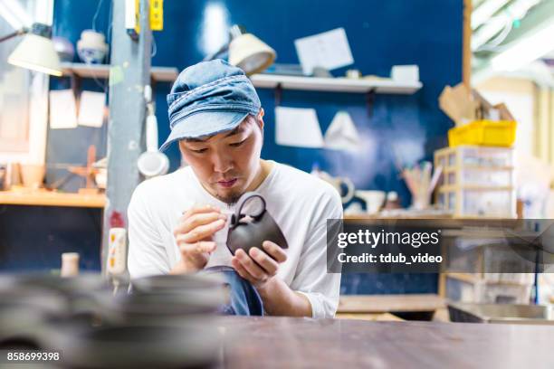 pottery at okinawa - tdub_video stock pictures, royalty-free photos & images