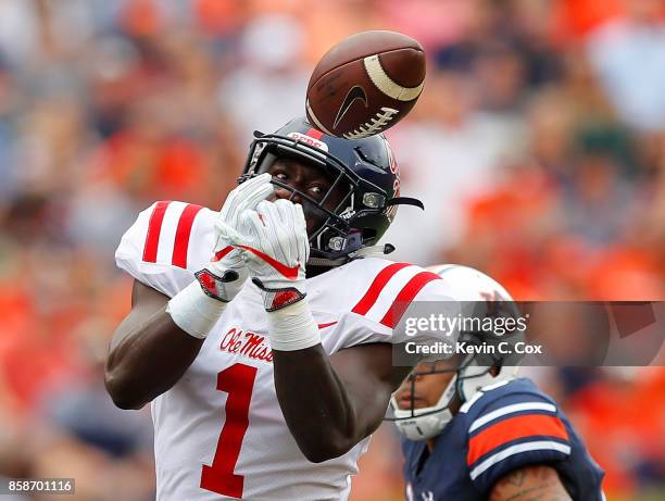 Brown of the Mississippi Rebels fails to pull in this reception against Tray Matthews of the Auburn Tigers at Jordan Hare Stadium on October 7, 2017...