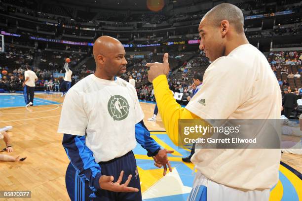 Dahntay Jones of the Denver Nuggets greets Chucky Atkins of the Oklahoma City Thunder prior to the game on April 8, 2009 at the Pepsi Center in...