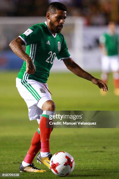 Javier Aquino of Mexico drives the ball during the match between Mexico and Trinidad & Tobago as part of the FIFA 2018 World Cup Qualifiers at...