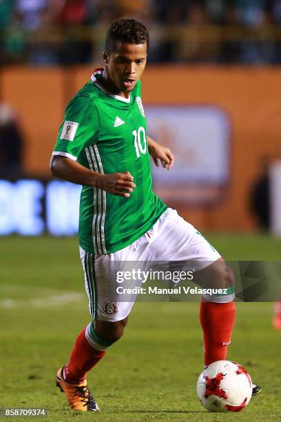 Giovani Dos Santos of Mexico drives the ball during the match between Mexico and Trinidad & Tobago as part of the FIFA 2018 World Cup Qualifiers at...