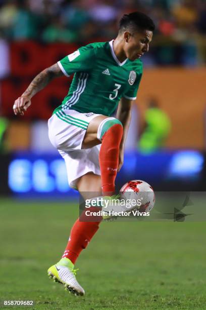 Carlos Salcedo of Mexico drives the ball during the match between Mexico and Trinidad & Tobago as part of the FIFA 2018 World Cup Qualifiers at...