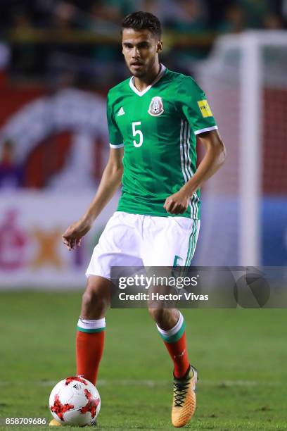 Diego Reyes of Mexico drives the ball during the match between Mexico and Trinidad & Tobago as part of the FIFA 2018 World Cup Qualifiers at Alfonso...