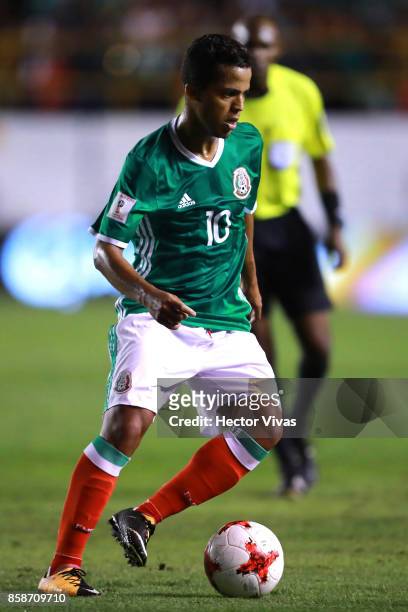 Giovani Dos Santos of Mexico drives the ball during the match between Mexico and Trinidad & Tobago as part of the FIFA 2018 World Cup Qualifiers at...