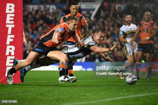 Danny McGuire of Leeds Rhinos scores a try during the Betfred Super League Grand Final match between Castleford Tigers and Leeds Rhinos at Old...