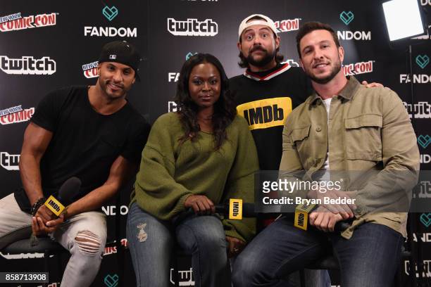 Ricky Whittle , Yetide Badaki , and Pablo Schreiber of American Gods pose with Kevin Smith onstage during IMDb LIVE at NY Comic-Con at Javits Center...