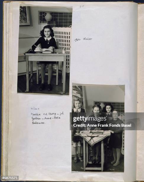 Page from Anne Frank's photo album containing two school snapshots, Amsterdam, Holland, winter 1940. Anne's friend Martha van den Berg is also...