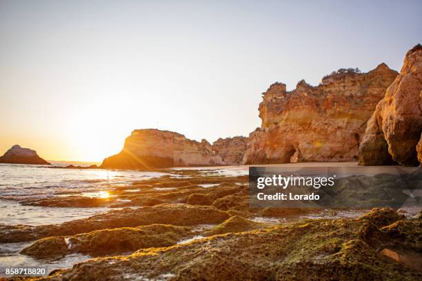 seascape images of beach in alvor portugal in late summer sun - alvor stock pictures, royalty-free photos & images