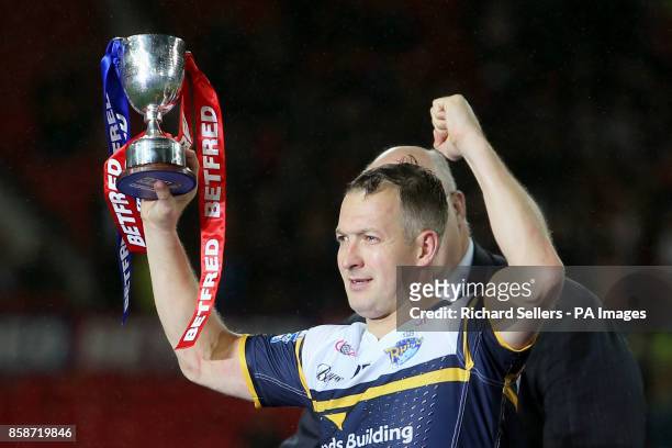 Leeds Rhinos' Danny Maguire celebrates with a man of the match trophy during the Betfred Super League Grand Final at Old Trafford, Manchester.