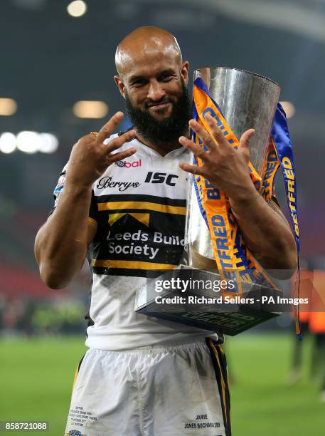 Leeds Rhinos' Jamie Jones Buchanan celebrates with the trophy after the final whistle during the Betfred Super League Grand Final at Old Trafford,...