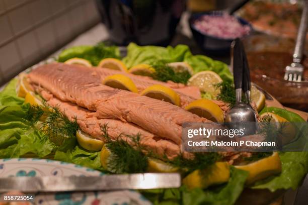 christmas in sweden - salmon on swedish christmas table - swedish culture stock pictures, royalty-free photos & images