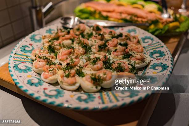 christmas in sweden - egg halves with shrimp and dill mayonnaise - swedish culture stock pictures, royalty-free photos & images