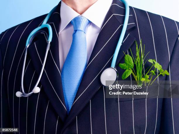 alternative medicine doctor. - homeopathic medicine stock pictures, royalty-free photos & images