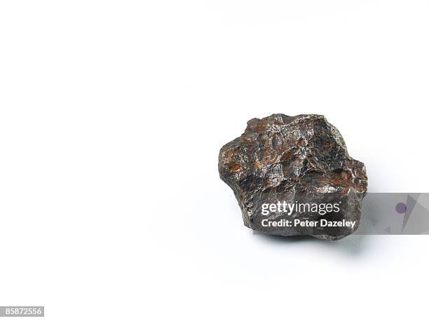 meteorite on white background. - meteorito imagens e fotografias de stock