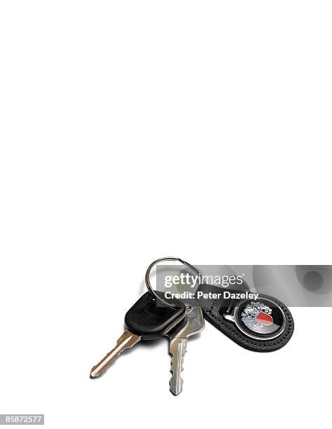 car keys on white background. - key ring stock pictures, royalty-free photos & images