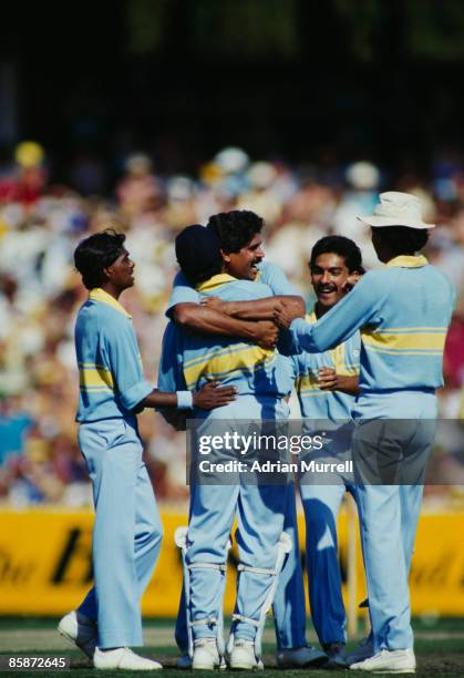 Members of the Indian cricket team celebrate during a match against Pakistan at Melbourne during the World Championship of Cricket One Day...