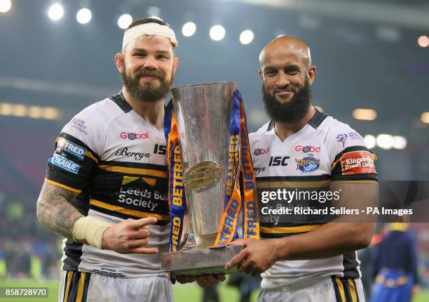 Leeds Rhinos' Cuthbertson and Jamie Jones-Buchanan celebrate with the trophy after the final whistle during the Betfred Super League Grand Final at...