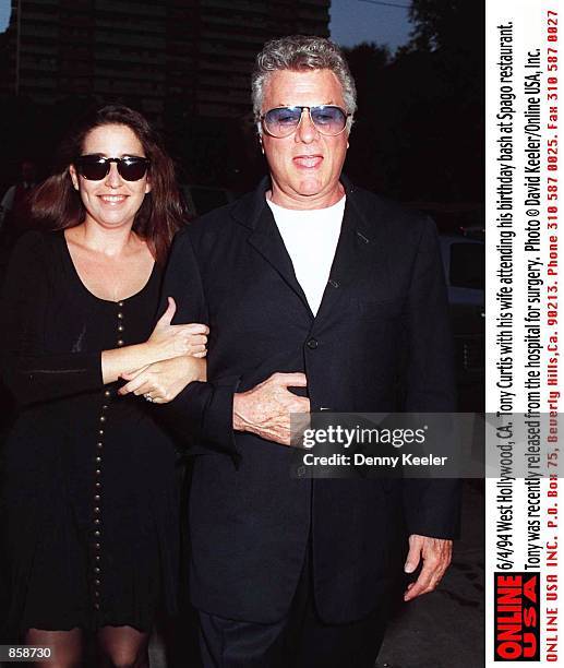 West Hollywood, CA. Tony Curtis with his wife, Lisa Deutsch arrive at Spago restaurant to celebrate his birthday. Tony was recently released from the...