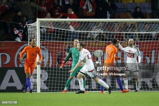 Virgil van Dijk of Holland, goalkeeper Jasper Cillessen of Holland, Sergei Balanovich of Belarus, Georginio Wijnaldum of Holland, Ivan Maevski of...