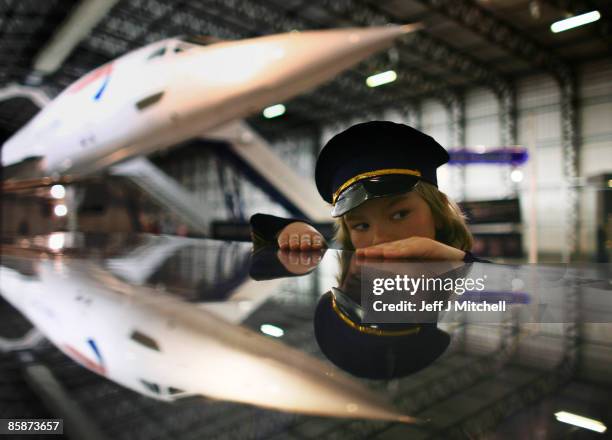 Young boy views a Concorde at the museum of flight in East Fortune on April 9, 2009 in Scotland. The aircraft is celebrating 40 years since its...