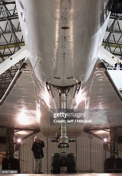 Man views a Concorde at the museum of flight in East Fortune on April 9, 2009 in Scotland. The aircraft is celebrating 40 years since its inaugural...