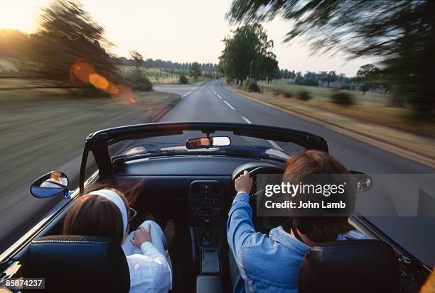 sports car - driving stock pictures, royalty-free photos & images