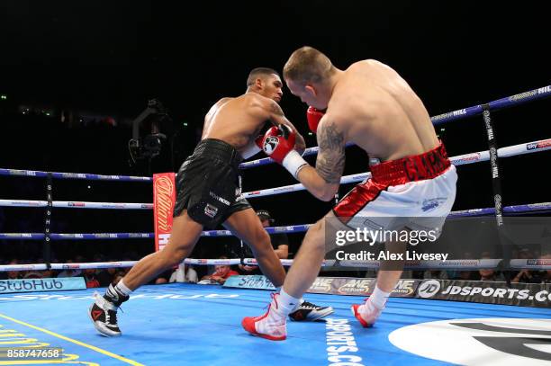 Conor Benn knocks down Nathan Clarke for the second time during the Welterweight Championship fight at Manchester Arena on October 7, 2017 in...