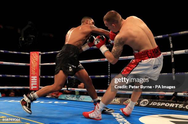 Conor Benn in action against Nathan Clarke during their Welterweight contest at Manchester Arena.