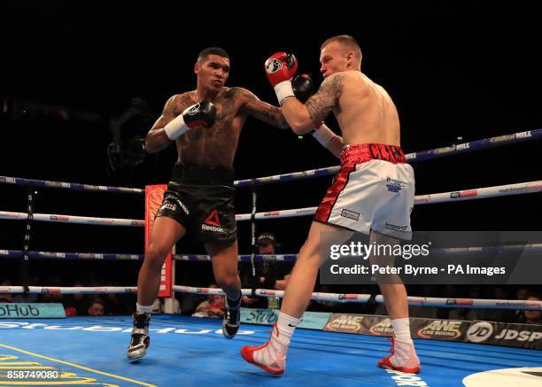 Conor Benn in action against Nathan Clarke during their Welterweight contest at Manchester Arena.