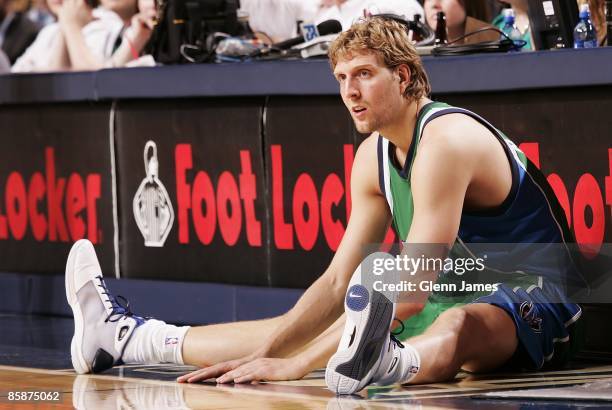 Dirk Nowitzki of the Dallas Mavericks waits to enter the game against the Detroit Pistons on March 17, 2009 at the American Airlines Center in...