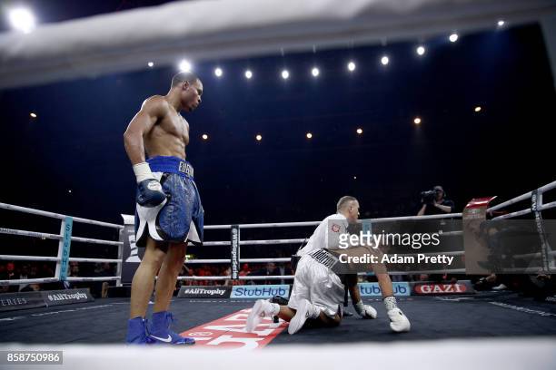 Avni Yildirim of Turkey is knocked down by Chris Eubank Jr. Of Great Britain during the Super Middleweight World Boxing Super Series fight at...