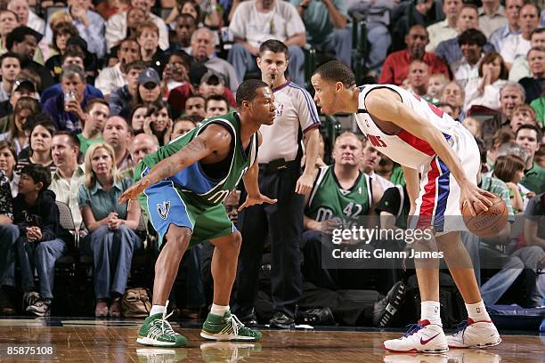 Tayshaun Prince of the Detroit Pistons looks to move the ball against Antoine Wright of the Dallas Mavericks during the game on March 17, 2009 at the...