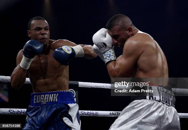 Avni Yildirim of Turkey and Chris Eubank Jr. Of Great Britain exchange punches during the Super Middleweight World Boxing Super Series fight at...