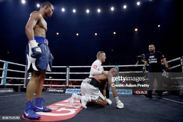 Avni Yildirim of Turkey is knocked down by Chris Eubank Jr. Of Great Britain during the Super Middleweight World Boxing Super Series fight at...