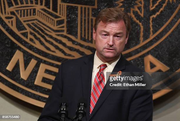 Sen. Dean Heller speaks at the culmination of a faith unity walk, held to help the community heal after Sunday's mass shooting, at Las Vegas City...