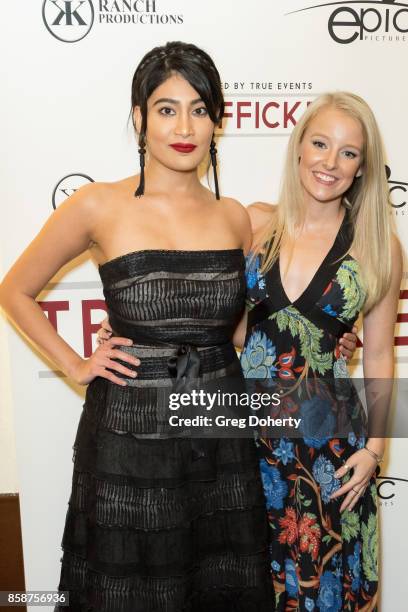 Actresses Alpa Banker and Kelly Washington attend the Premiere Of Epic Pictures Releasings' "Trafficked" at the Aero Theatre on October 6, 2017 in...