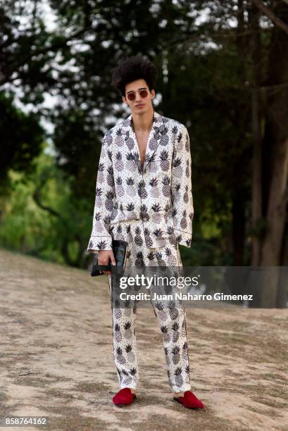 Luis Borges wears Channel handbag and Dolce & Gabbana pijama and shoes during Lisbon Fashion Week 'ModaLisboa' Spring/Summer 2018 at Pavilhao Carlos...