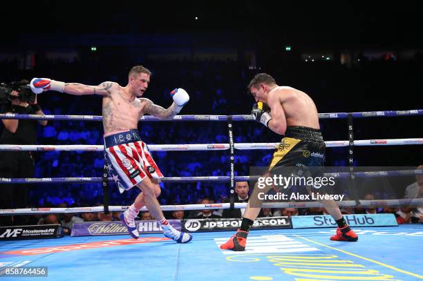 Anthony Crolla rocks Ricky Burns during the last round of their Lightweight contest at Manchester Arena on October 7, 2017 in Manchester, England.