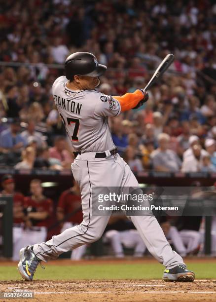 Giancarlo Stanton of the Miami Marlins bats against the Arizona Diamondbacks during the MLB game at Chase Field on September 24, 2017 in Phoenix,...